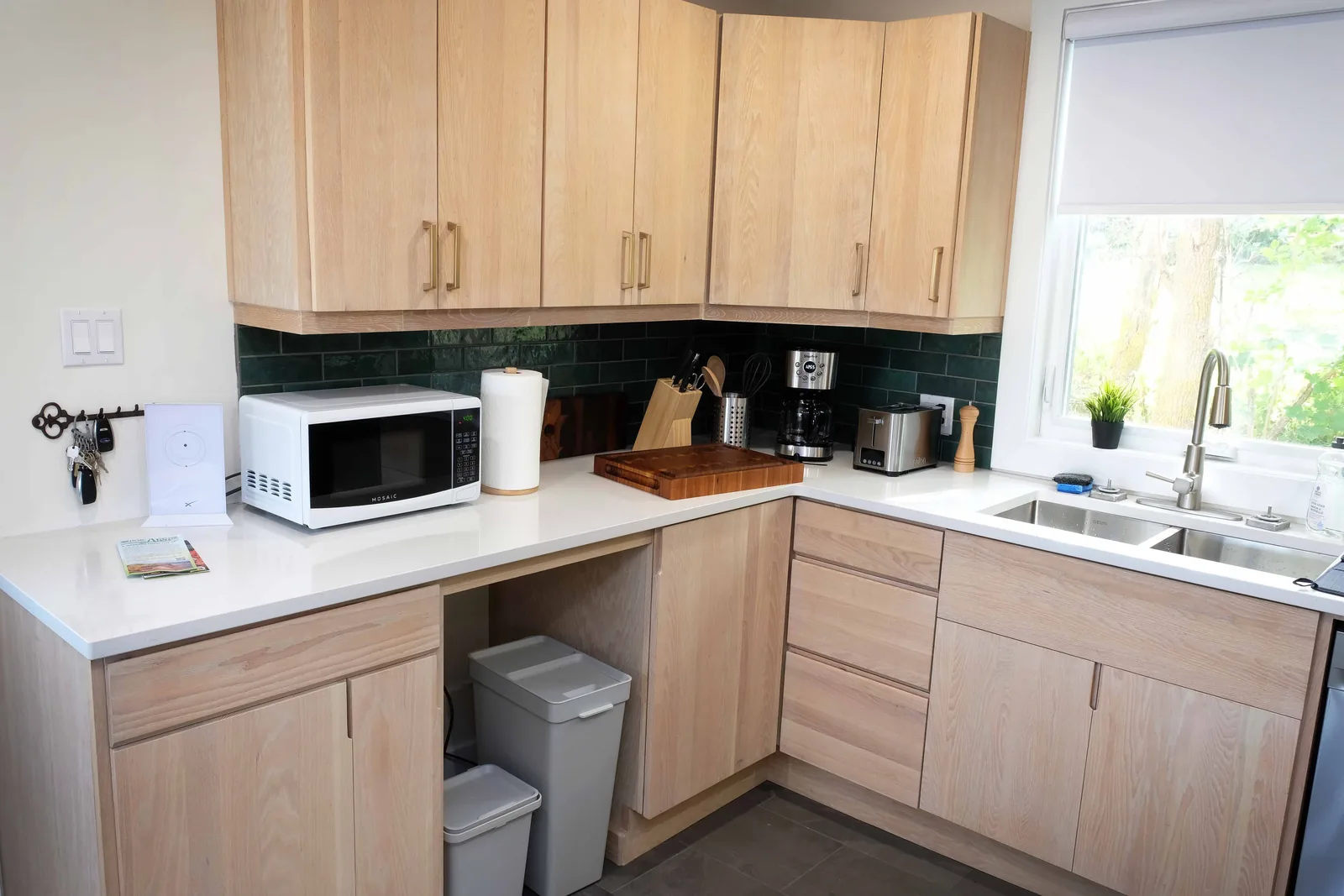 Kitchen fitted with light oak cabinetry